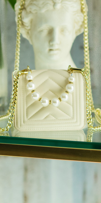 Trendy ultra mini handtas met pearl handle beige